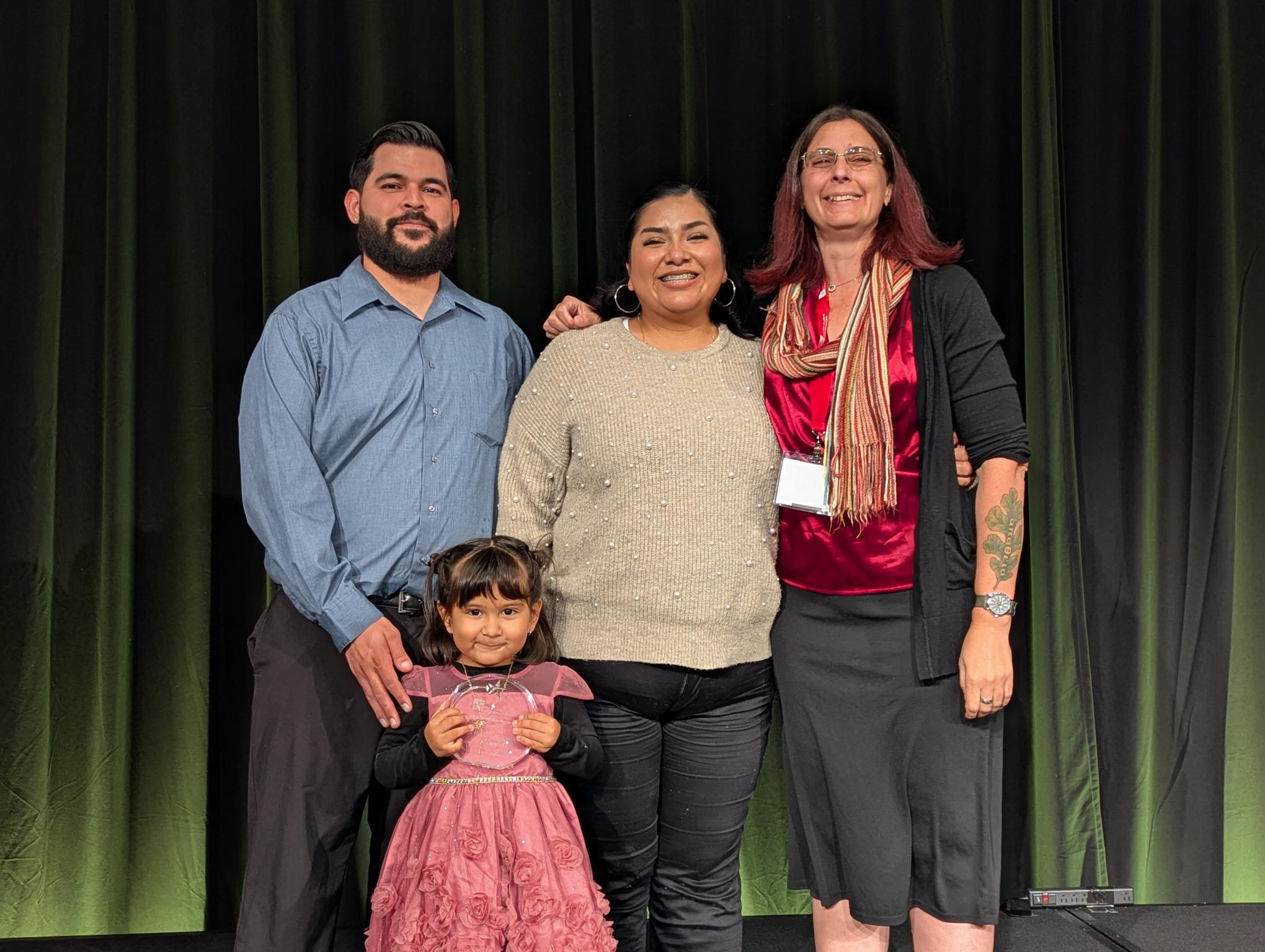 A group of people posing for a photo
